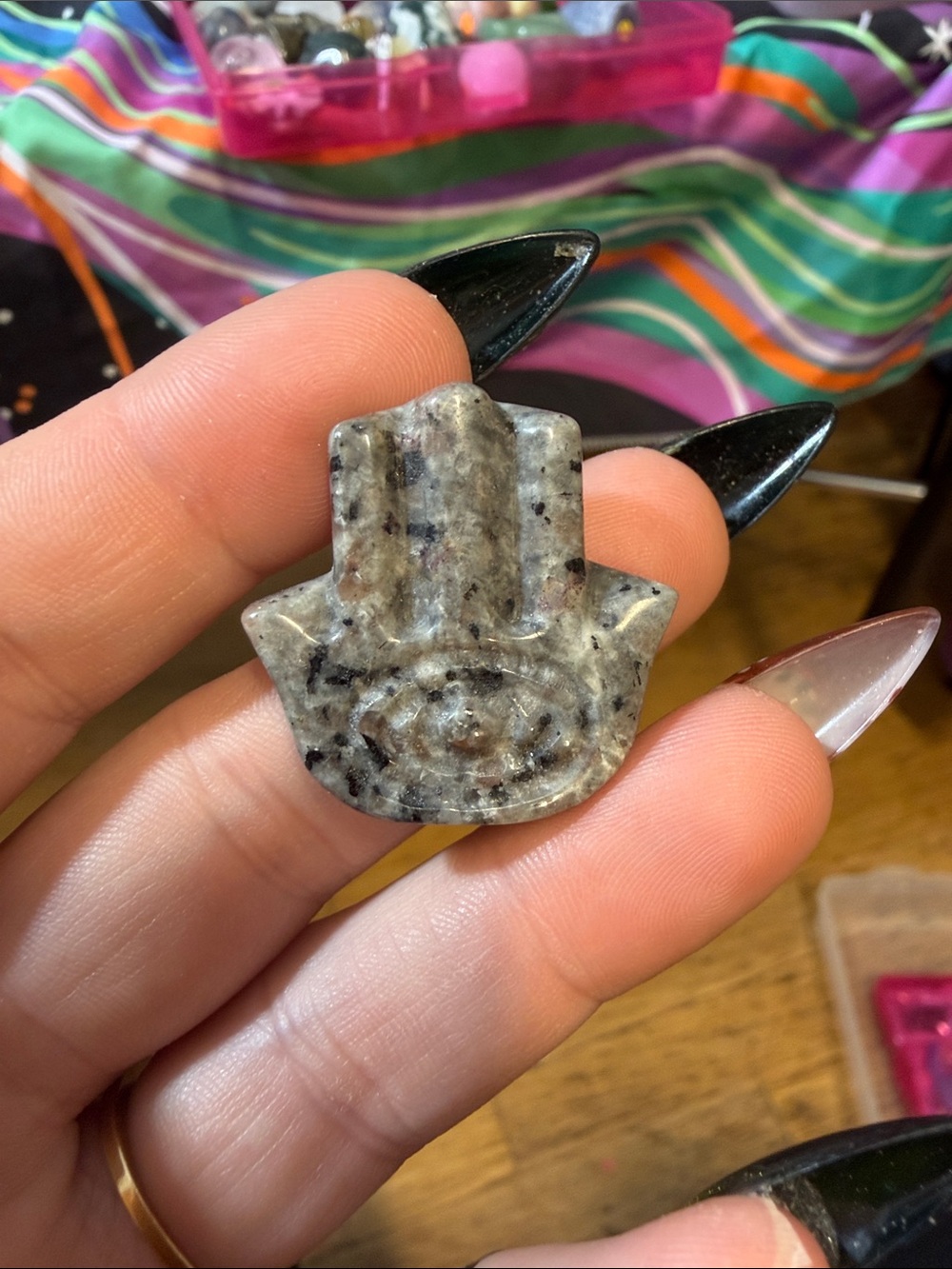Gray Speckled Stone Hamsa Hand Charm - yooperlite-glows under black light
